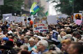 People fill 58th Street between 8th and 9th Avenue in New York before a climate changes protest march